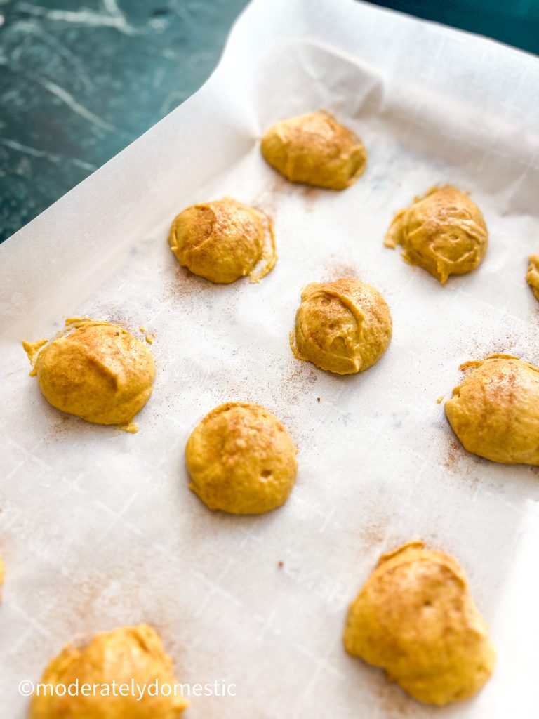 Pumpkin spice cookies with cinnamon-sugar topping before baking